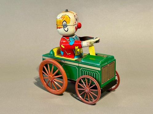 Yone - Blikken speelgoedfiguur - Clown in oldtimerauto -, Antiek en Kunst, Antiek | Speelgoed