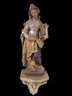 Snijwerk, Farbige Holzfigur auf einer Wandkonsole - Cäcilia