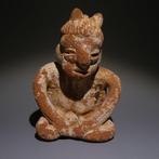 Colima, Westkust Mexico Terracotta Zittend figuur. 7 cm H.