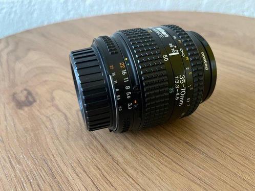 Nikon AF Nikkor 35-70 F/3.3-4.5 + AF-Nikkor 28-70/3.5-4.5D, Audio, Tv en Foto, Fotocamera's Analoog