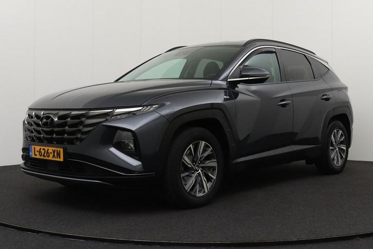 Zakelijke Lease |  Hyundai Tucson 1.6 T-GDI MHEV Comfort Sma, Auto's, Hyundai, Dealer onderhouden, Lease, Zwart, Handgeschakeld