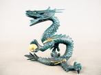 Brons - Masayoshi  - Bronzen drakenbeeldje met een draak