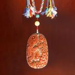 Uniek rode edelsteen-amulet - met de hand uitgehouwen