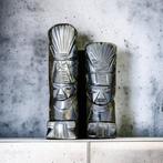 Koppel van Azteekse beeldjes in goudkleurige obsidiaan.