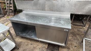 Solide RVS werktafel met schuifd. 180x70x90/95 bxdxh cm beschikbaar voor biedingen