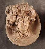 Paar antieke reliëf plaquettes - Plaquette - Gepatineerd