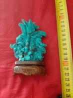 een beeldje van een godheid - natuurlijke turquoise -