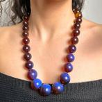 Natuurlijke Birmese amber ketting met sterke blauwe