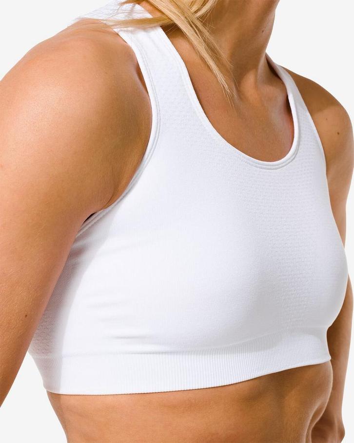 HEMA Damessporttop medium support naadloos wit korting, Kleding | Dames, Overige Dameskleding, Nieuw, Verzenden