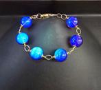 Natuurlijke Birmese amber armband, met sterke blauwe