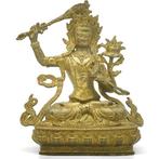Een verguld bronzen beeld van Manjushri, de Bodhisattva van