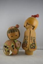 Vintage Kokeshi-poppen gemaakt door Suigai Sato en Ishida