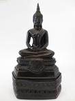 zwarte mediterende Thaise Boeddha