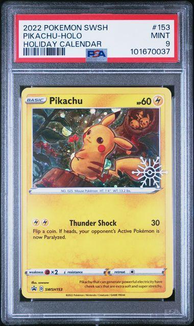 PSA 9 | Pikachu Holo Holiday Calendar | SWSH Black Star, Hobby en Vrije tijd, Verzamelkaartspellen | Pokémon, Ophalen of Verzenden