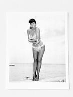 Bunny Yeager (1929–2014) - Pin-up Bettie Page nude in beach,