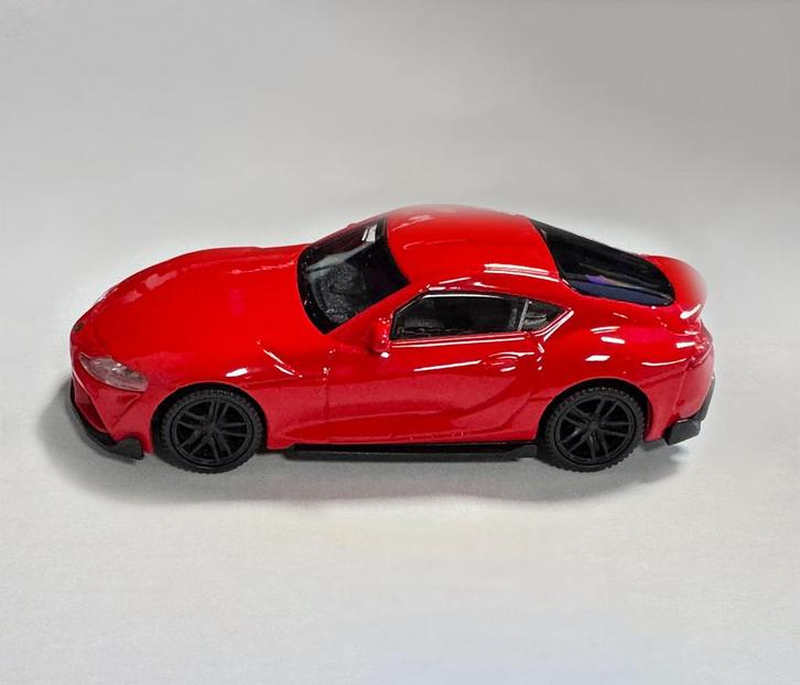 Schaalmodel Toyota Supra (schaal 1:43, ca. 10x4x3 cm, rood), Hobby en Vrije tijd, Modelauto's | 1:43, Nieuw, Ophalen of Verzenden