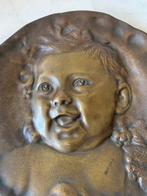 Emile DERRÉ (1867-1938) - Reliëf, Bébé rieur - 21 cm - Brons