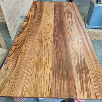 Houten tafel van Zebranohout zeer exclusief beschikbaar voor biedingen