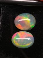 3.46 tcw Natural White Opals Cabochons- 0.69 g - (2)