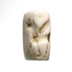 Neo-Assyrian fossiele schelp Cylinder seal