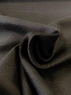Prestigieus, stevig maar zeer zacht zwart textiel. -