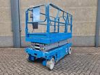 Veiling: Schaarlift Genie GS-2046 Elektrisch 8.1m 2000, Zakelijke goederen, Machines en Bouw | Liften, Steigers en Ladders, Ophalen