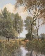 W.J. Alberts (1912-1990) - Koeien in een landschap bij