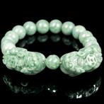 Twee handgesneden Bixie sculpturen Nefriet Jade armband met