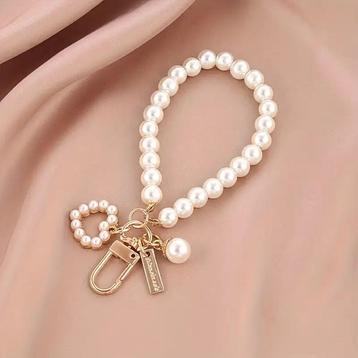 Elegante Kunstparel Sleutelhanger Met Harten Schelp Bedel beschikbaar voor biedingen