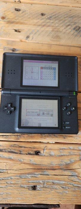 Nintendo - DS - DS noire avec jeux en très bon état de beschikbaar voor biedingen