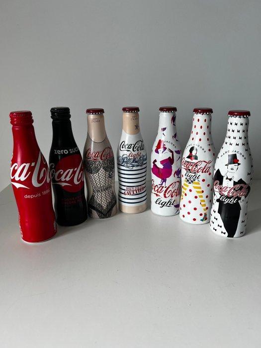Themacollectie - Exclusieve set – 7 flessen Coca-Cola, Antiek en Kunst, Antiek | Speelgoed