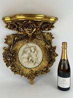 Wanddecoratie - Een grote wandconsole met cherubs - Italië