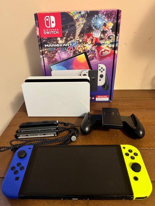 Nintendo - Switch - OLED with blue/yellow Joy-Con and games, Spelcomputers en Games, Spelcomputers | Overige Accessoires