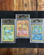 Pokémon - 3 Graded card - Blastoise, Charizard, Venusaur,, Hobby en Vrije tijd, Nieuw