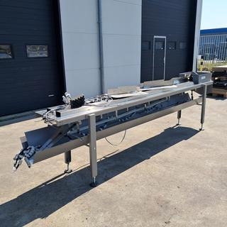 Aan-afvoerbaan t.b.v. flowpackmachine beschikbaar voor biedingen