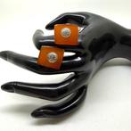 Oude manchetknopen met Baltische amber cabochons. -