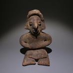 Colima, Westkust Mexico Terracotta Zittend figuur. 11 cm H.