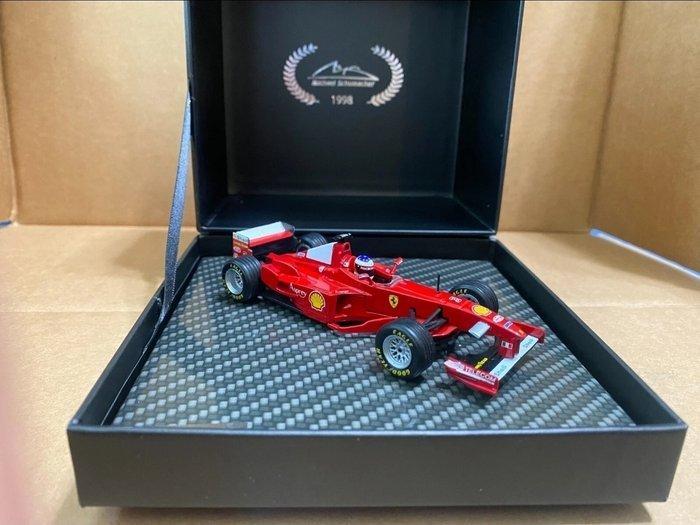 IXO 1:43 - Modelauto - Michael Schumacher Ferrari F300 #3, Hobby en Vrije tijd, Modelauto's | 1:5 tot 1:12