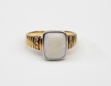 Een bi-color gouden ring 14k beschikbaar voor biedingen