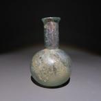 Oud-Romeins Glas Flesje. 1e-3e eeuw n.Chr. Hoogte 8,5 cm.