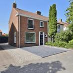 Tweekapper met tuin en garage, Sas-van-gent