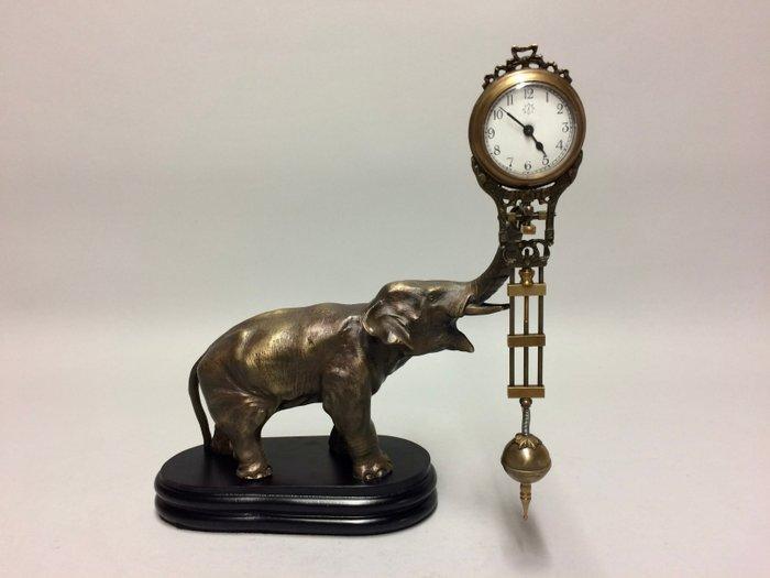 Mystery slingerklok OLIFANT (2) - Legering - 2020+, Antiek en Kunst, Antiek | Klokken