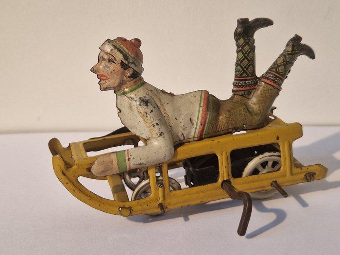 Johann Distler - Penny Toy, Featuring A Boy On A Sled,, Antiek en Kunst, Antiek | Speelgoed