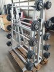 Barbell rek met barbells in veiling leegverkoop GYM