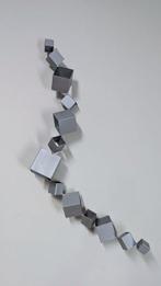 D.B - Escultura mural Orden en Ruptura