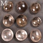 Set van natuurlijke rokerige kwarts palmstenen – Madagaskar