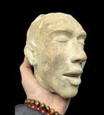 A fabulous but strange death plaster head artisanal creation
