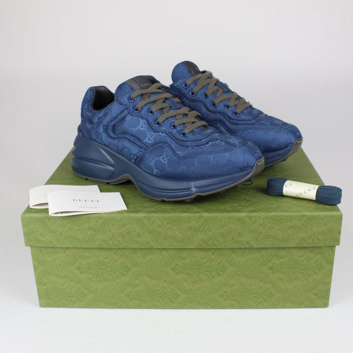 Gucci - Gucci Embossed GG Rhyton Sneakers in Blue – Made in, Kleding | Heren, Schoenen