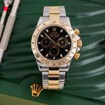 Rolex - Daytona Cosmograph Black Dial Two Tone 18k - 116523, Sieraden, Tassen en Uiterlijk, Horloges | Heren, Nieuw