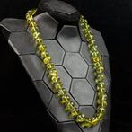 Groene amberketting: schat van onvergelijkbare verfijning. -